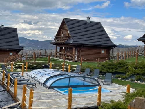 Domki Zagroda Domek z bala z basenem & sauna & balia z hydromasażem