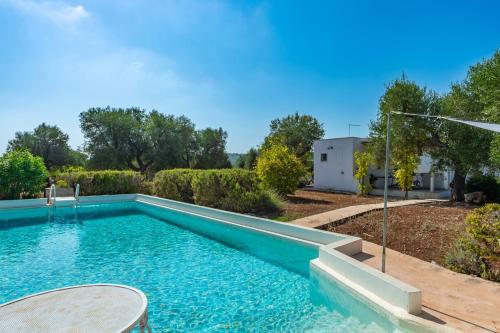 Swimming pool, Villa Lavanda by Rentbeat in Pascarosa