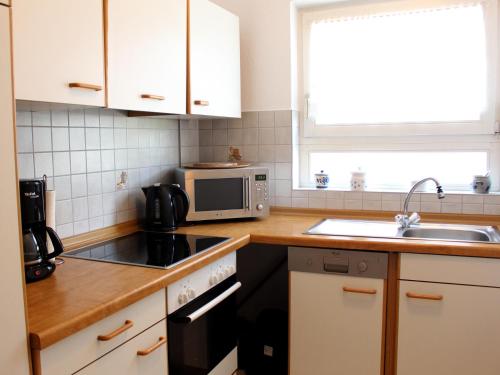 Kitchen, Ferienwohnung Am Muhlkanal - Schon gelegen mit Balkon und Blick ins Grune in Langenargen