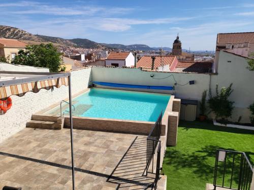 Casa Rural Oasis, una casa rural en Puertollano, agradable, con Piscina en zona tranquila