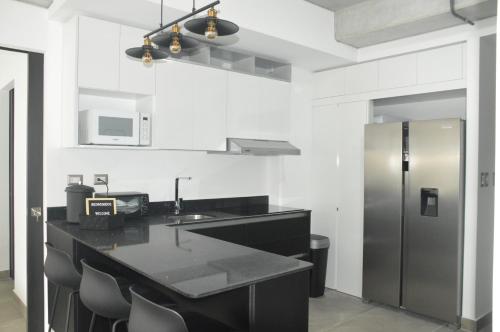 Cocina, Cozy Stays Cayala Apartments (401) in Zona 16