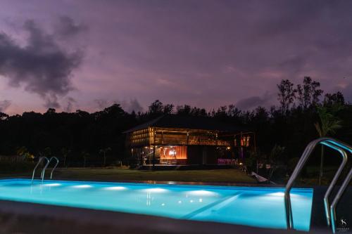 Swimming pool, REDBERRY'S LUXURY STAY in Somvarpet