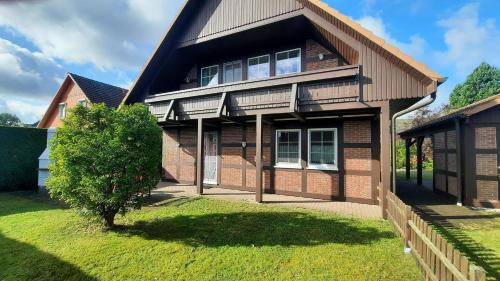 Ferienhaus Wilhelmine Usedom Ferienwohnungen mit Garten & Grill in Mölschow, Deutschland