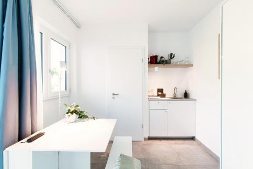 Le Betulle Studios by Quokka 360 - Studio Apartments by Lake Origlio - image 2