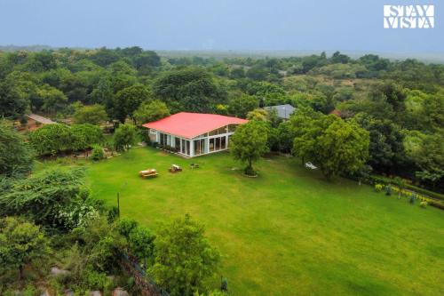 StayVista's Idyllic Farmstay - Glasshouse - Amidst Orchards with Lawn featuring a Gazebo, Splash Pool & Massage Chair