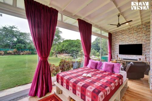 StayVista's Idyllic Farmstay - Glasshouse - Amidst Orchards with Lawn featuring a Gazebo, Splash Pool & Massage Chair