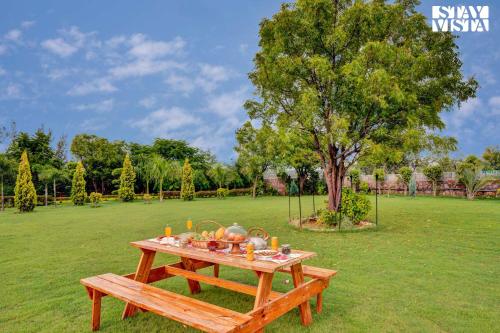 StayVista's Idyllic Farmstay - Glasshouse - Amidst Orchards with Lawn featuring a Gazebo, Splash Pool & Massage Chair