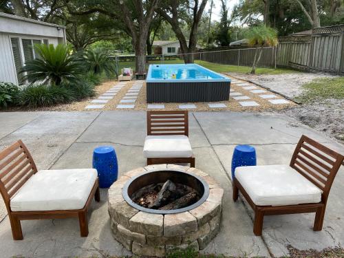 Reel relaxing across from River in Huge 24 foot Swim Spa in Tampa, USA