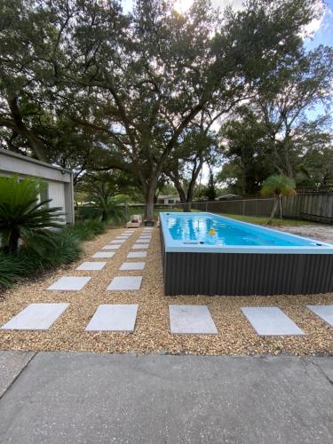 Reel relaxing across from River in Huge 24 foot Swim Spa in Tampa, USA