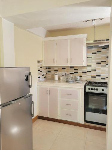 bucătărie, KanXio's Apartment in Roseau