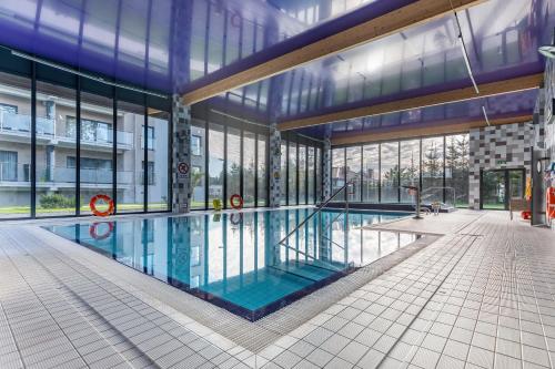 Apartment Five Seas with Parking & Swimming Pool by Noclegi Renters - Location saisonnière - Sianożęty