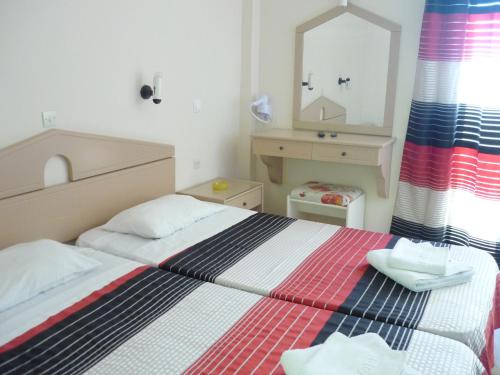 Karina Hotel The 2-star Karina Hotel offers comfort and convenience whether youre on business or holiday in Corfu Island. The hotel has everything you need for a comfortable stay. Facilities like free Wi-Fi in al