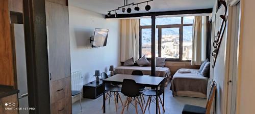 SKi & SNOW APARTMENTS - PLAZA PRINCIPAL JUNTO A LOS TELECABINAS by TODOSIERRANEVADA in Sierra Nevada