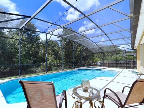 Lovely 4 Bed 3 Bath Pool Home with Spa-5330CVL home in Kissimmee, USA