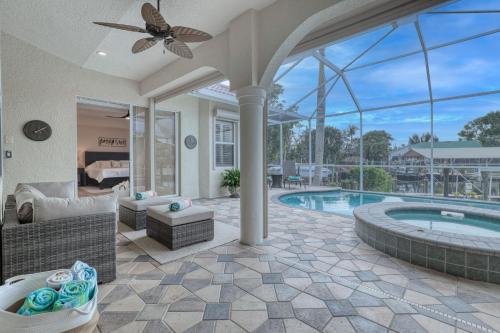 Newly renovated 3 bed/3 bath in the Four Mile Cove area w. heated pool and spa. Gulf access!