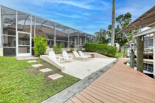 Newly renovated 3 bed/3 bath in the Four Mile Cove area w. heated pool and spa. Gulf access!