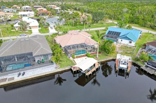 Newly renovated 3 bed/3 bath in the Four Mile Cove area w. heated pool and spa. Gulf access!