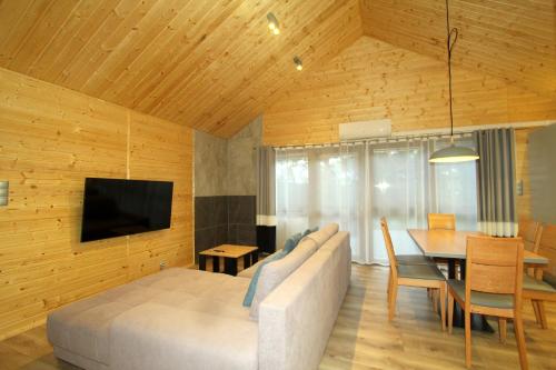 Całoroczny drewniany domek Superior i apartamenty Eko-oaza w Krynica Morska-Piaski