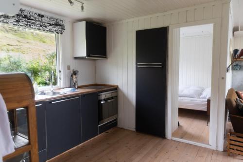 Cottage with stunning view of the sea and islands. in Hósvík
