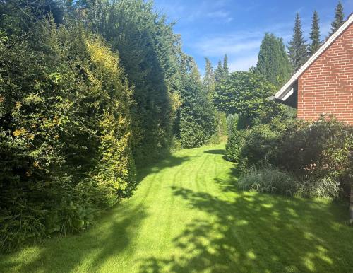 Jardín, The Kreideberger - Haus mit Platz in Lubeck Suburbs