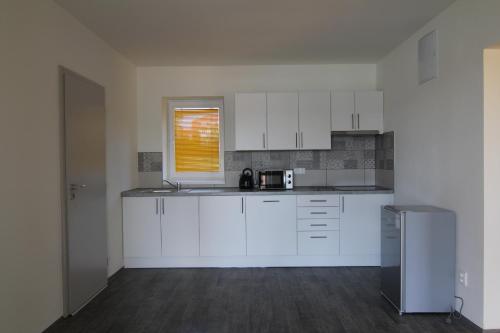 Konyha, Trdlovy Apartmány a Chata Tatranec v areálu Jaškovské krčmy (Trdlovy Apartmany a Chata Tatranec v arealu Jaskovske krcmy) in Terlicko