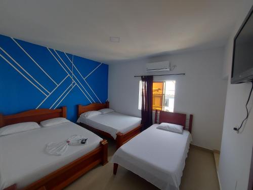 2 double beds, 1 twin bed