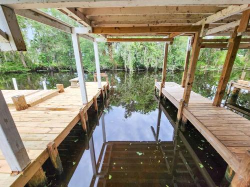 Astor River House with 2 private boat slips in Astor, USA