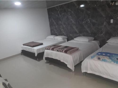 2 queen beds, 1 twin bed