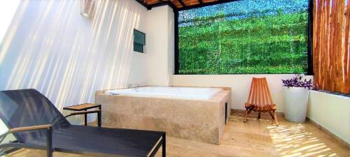 2 Story with SpaTub, Oceanview Roof Pool & Gym Onsite in Playa del Carmen, Mexico