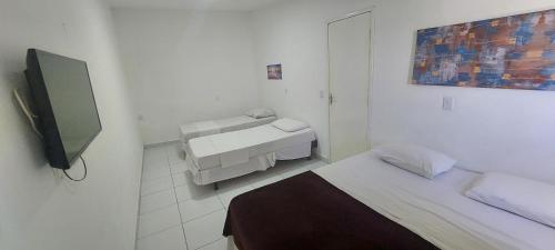 Quadruple Room room in Santorini Praia Hotel