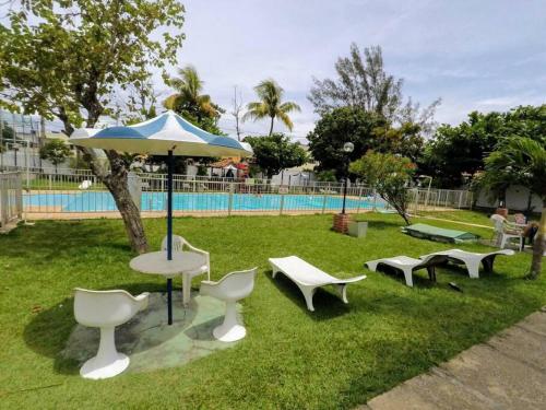 Loft em condomínio com piscina em Cabo Frio (Loft em condominio com piscina em Cabo Frio) in Jardim Flamboyant