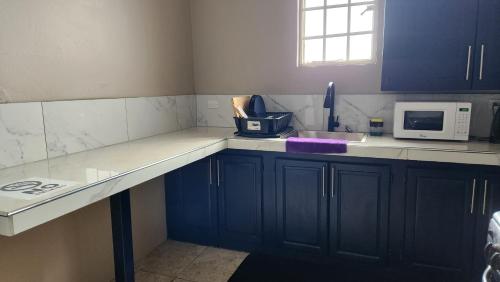 Facilities, The Layover - 6 mins from the airport, Fully equipped for short and long stays in Piarco