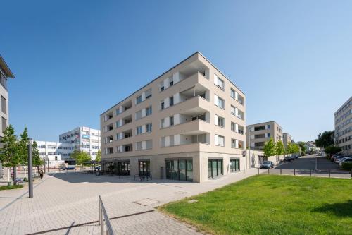 EXQUIS Design 3-Zimmer-Apartment I Balkon I Parkplatz I Top-Lage I Mercedes-Benz I Kinderbetten