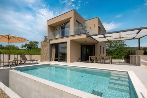 Modern villa Venta with jacuzzi and pool in Buje