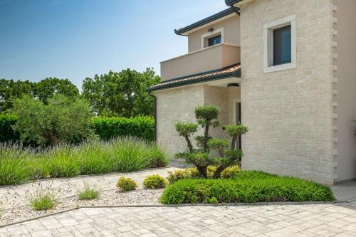 Family villa Maria with pool in Vizinada