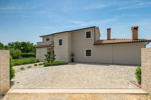 Family villa Maria with pool in Vizinada