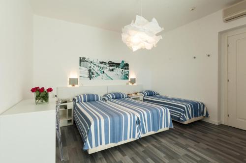 Triple Room with Garden View room in Albergo alla Spiaggia