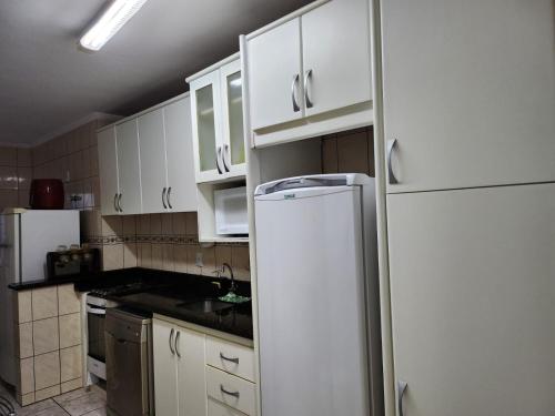 Apartamento pé na Areia