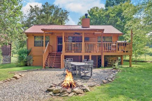 Riverfront Cabin with Hot Tub and Mountain Views!