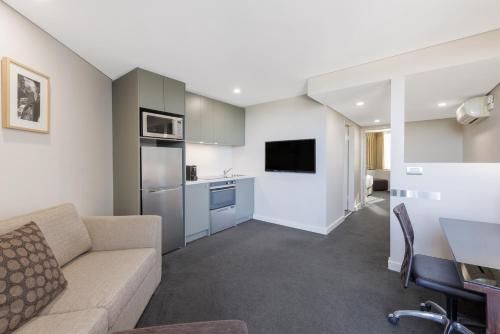 Two-Bedroom Apartment with Balcony room in Amora Herencia Riverwalk Melbourne