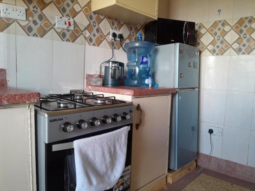 virtuvė, Comfort Haven with Secure Parking & Unlimited WiFi in Embu