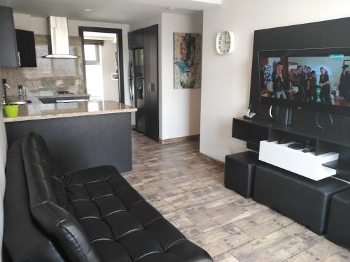Apartasuites AV, Медельин