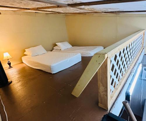 Acorn Hideaways Canton Gold Panner Bunkhouse King Bed