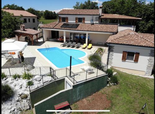 4 bedrooms villa with private pool enclosed garden and wifi at Zminj