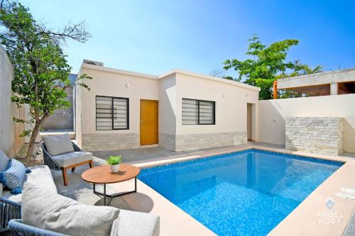 NEW Comfy Stay with Pool Onsite Steps from Malecón