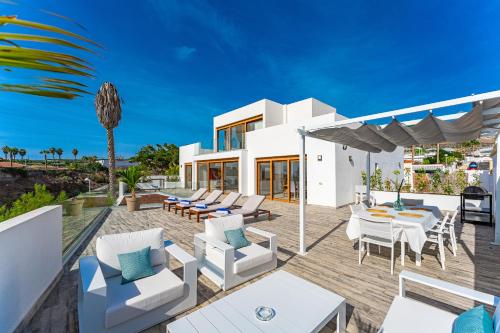 Fabulous contemporary 5 bedroom villa with private heated pool, sleeps max 13