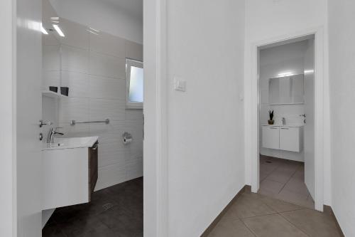 Three-Bedroom Apartment with Balcony and Sea View image 10