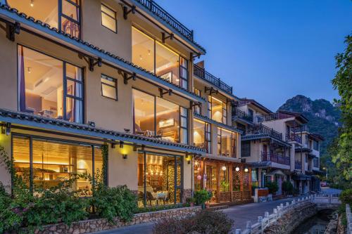 Utvendig, Guilin Village Creek Inn--Fee pick up service over three nights in Fløytesivgrotten