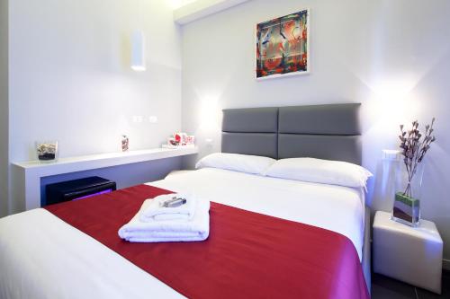 NearHome Smart Suites Guest House, Rom (Foto 9)