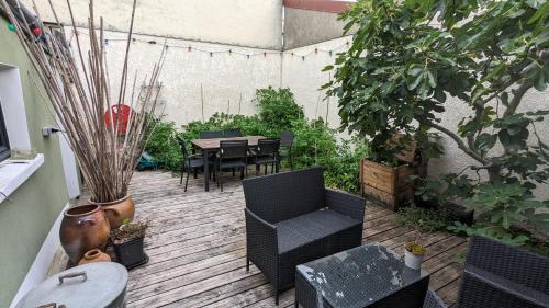 "Maison verte" - terrasse - parking - 10min du métro - Location saisonnière - Montreuil